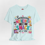 Motherhood Snack T‑Shirt — "Surviving Motherhood One Snack at a Time" Mom Tee