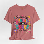 Motherhood Snack T‑Shirt — "Surviving Motherhood One Snack at a Time" Mom Tee