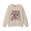 Motherhood Snack Crewneck Sweatshirt — "Surviving Motherhood One Snack at a Time"